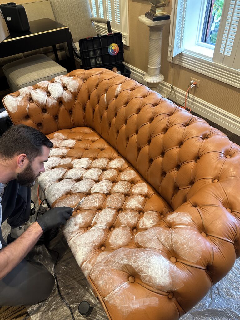 Chesterfield leather repair in progress