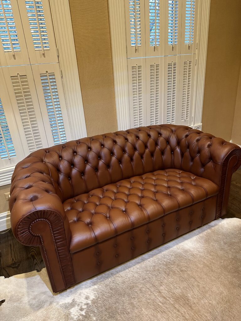 Restored Chesterfield sofa after repair