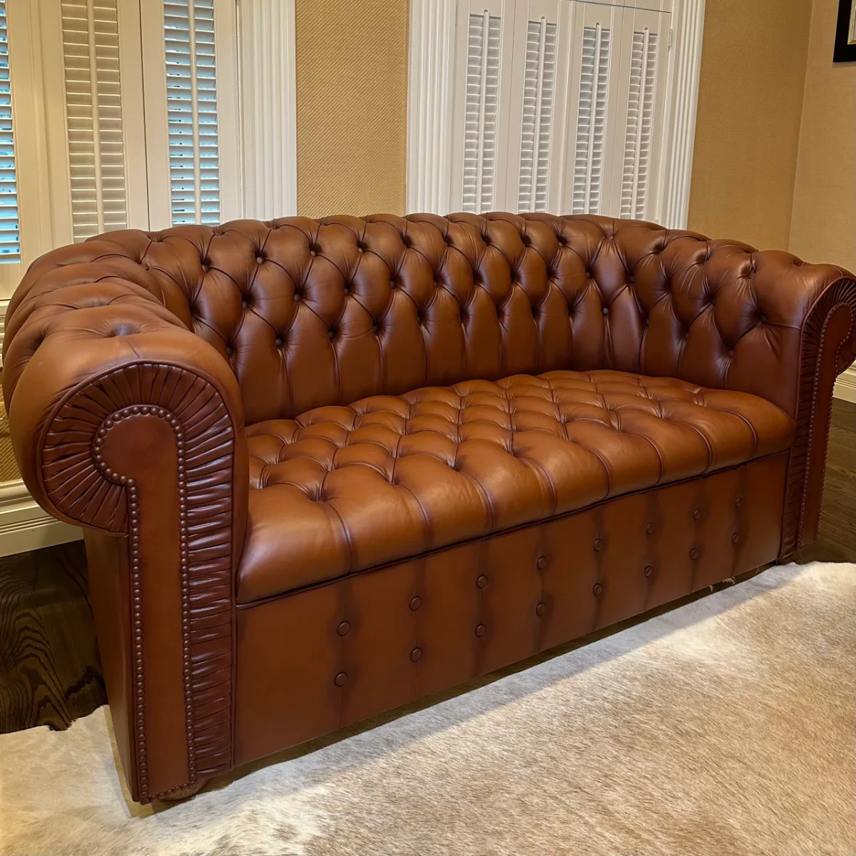 Chesterfield leather sofa restoration — after