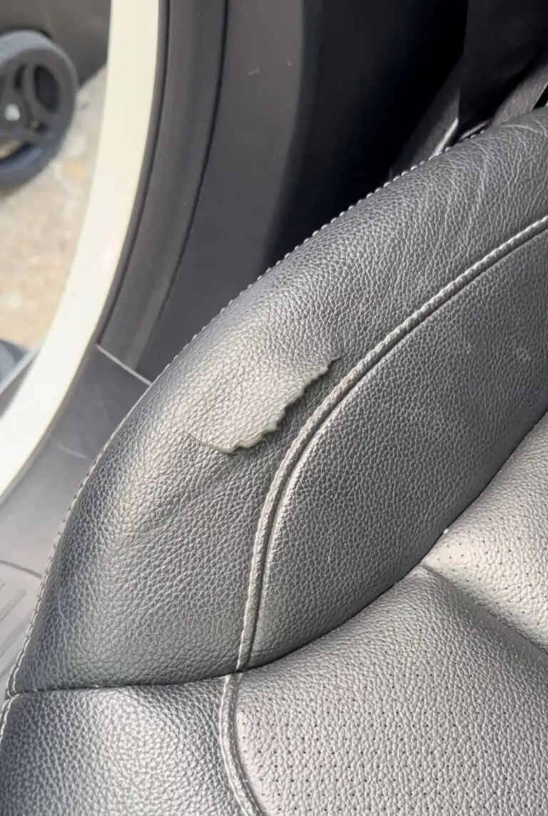Peeling vinyl on car seat before repair