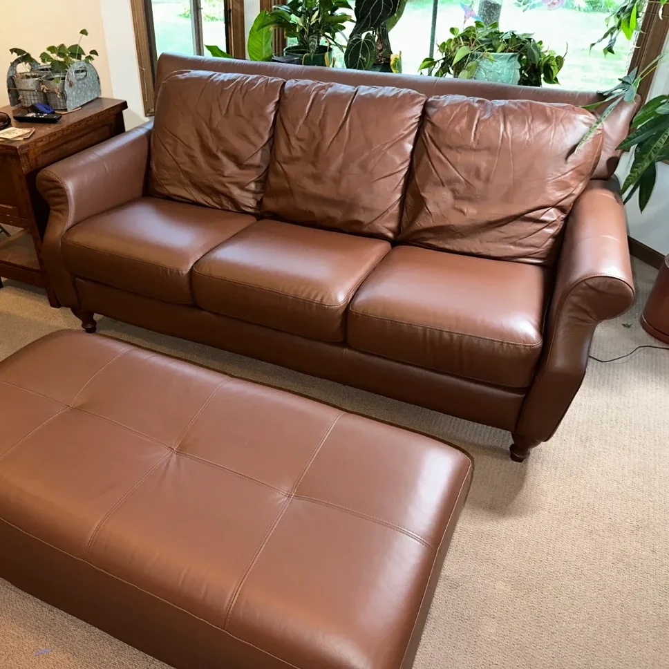 Leather sofa seat tops reupholstered — after