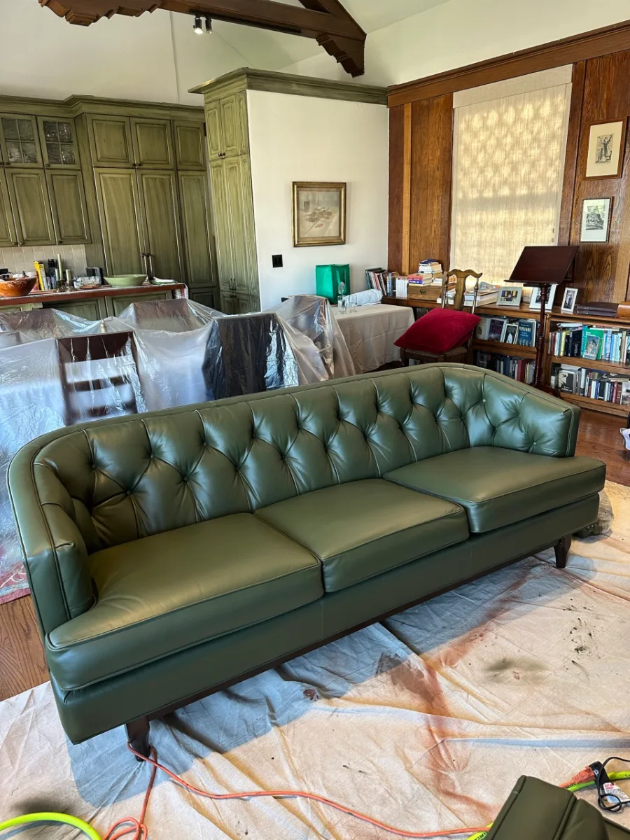 Faded tufted sofa recolored to match the kitchen (after)