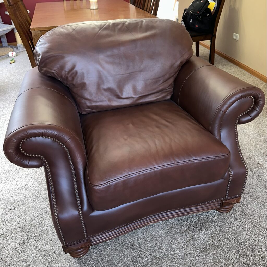 Brown leather armchair scratched by a cat: full restoration (after)