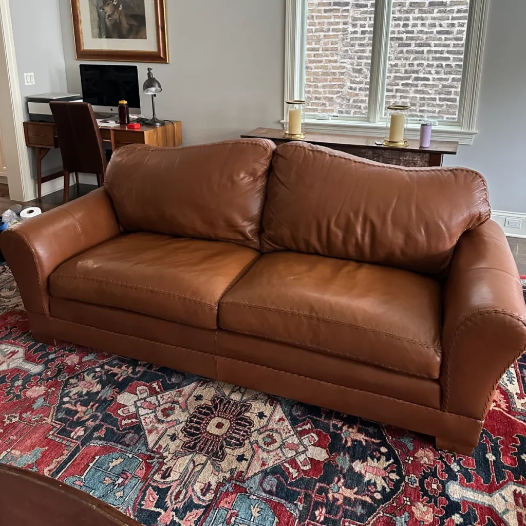 Tan leather sofa: sagging, worn cushions refilled and restored (after)